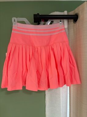 Pink Pleated Athletic Skort with Striped Waistband